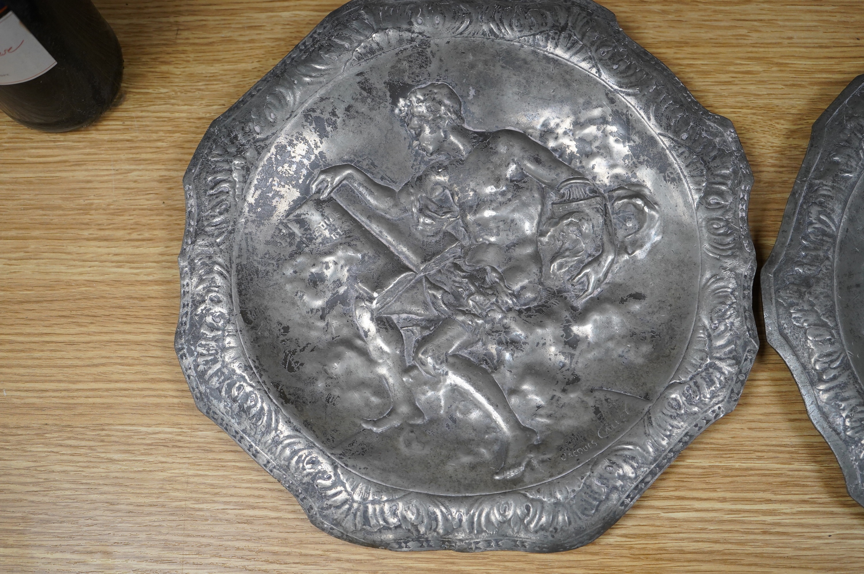 A pair of French pewter Art Nouveau plaques, signed Jacques Callot, 30cm. Condition - fair